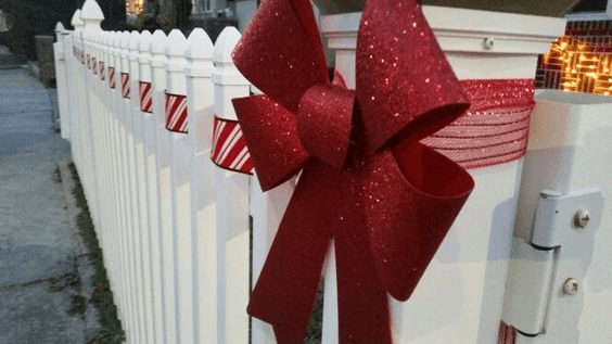 Christmas fence decorations ribbons and bows